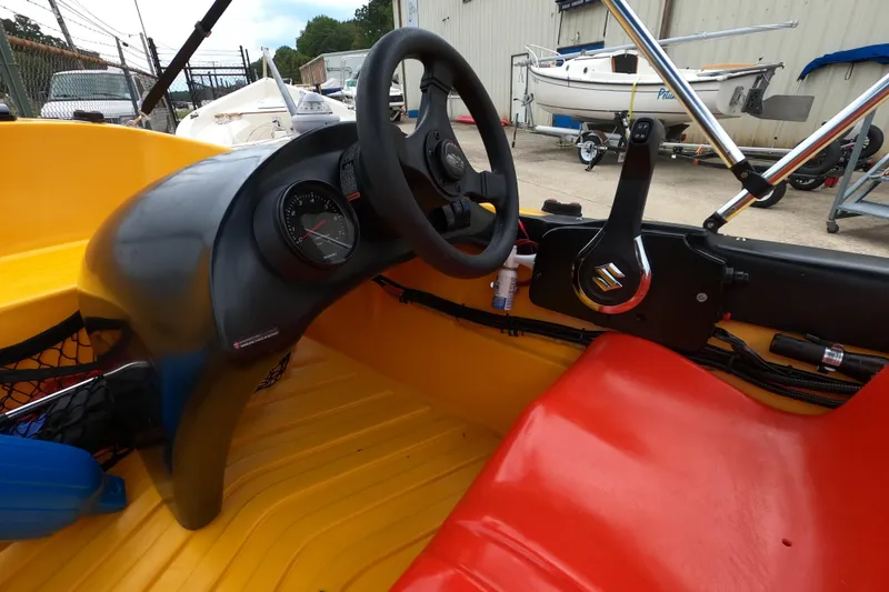 Slide: The Image of 2022 River Boats 290XR cockpit with steering wheel and control panel. - 11