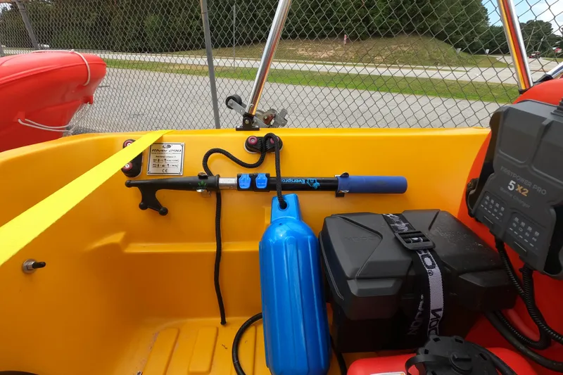 Slide: The Image of Interior of a 2022 River Boats 290XR with equipment and accessories. - 12