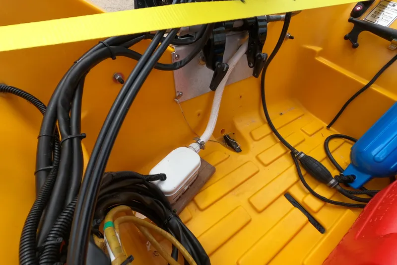 Slide: The Image of Interior view of 2022 River Boats 290XR, showcasing wiring and components. - 13