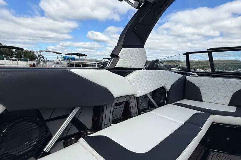 Slide: The Image of 2023 Tigé 24RZX boat interior with luxurious seating and modern design. - 11