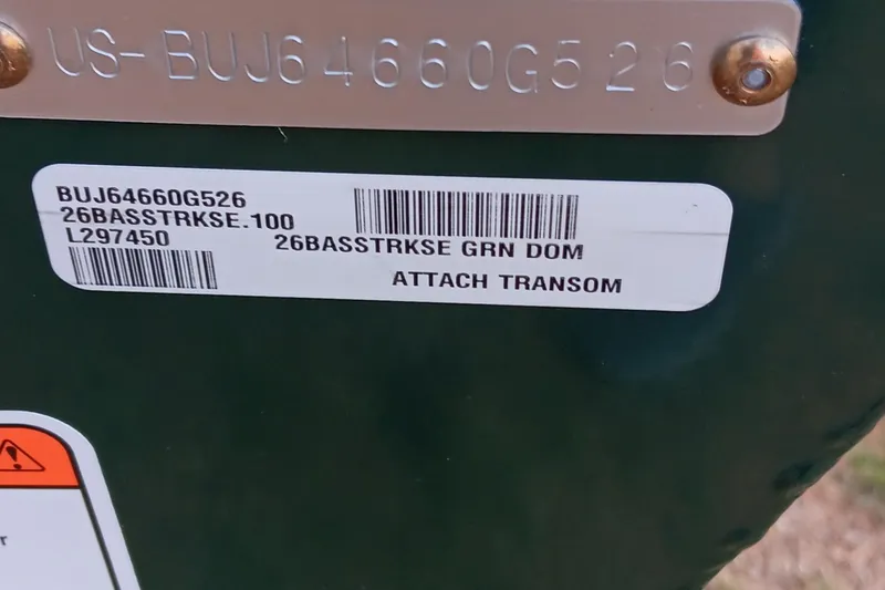 Slide: The Image of 2026 Tracker Bass Tracker Classic Limited identification plate with serial and barcode details. - 19