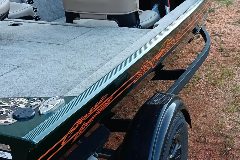 Slide: The Image of 2026 Tracker Bass Tracker Classic Limited boat on trailer, featuring sleek design and comfortable seating. - 5