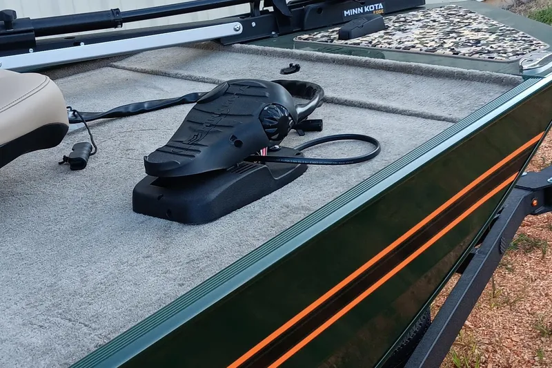 Slide: The Image of 2026 Tracker Bass Tracker Classic Limited boat deck with Minn Kota trolling motor. - 6