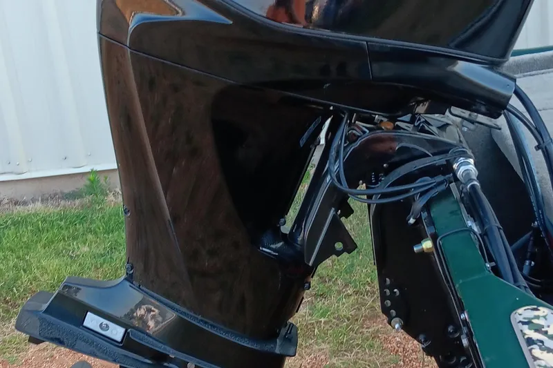 Slide: The Image of 2026 Tracker Bass Tracker Classic Limited outboard motor, close-up view. - 9