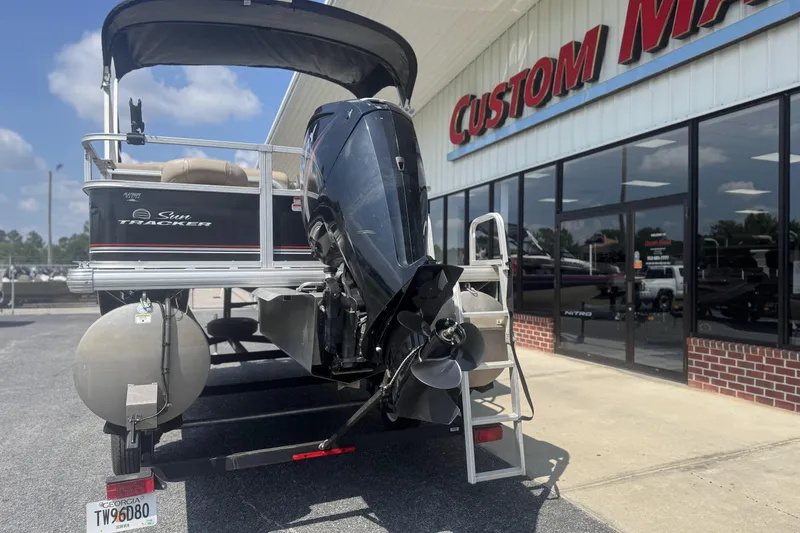 Slide: The Image of 2017 Sun Tracker Bass Buggy 18 DLX pontoon boat outside dealership. - 13