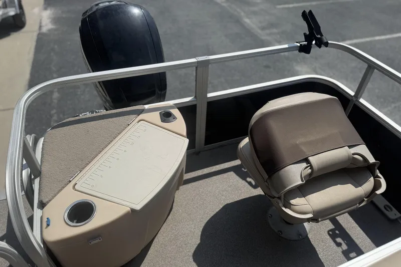 Slide: The Image of 2017 Sun Tracker Bass Buggy 18 DLX boat with fishing seat and motor. - 17