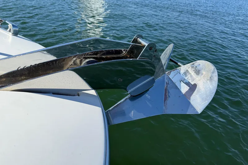 Slide: The Image of Close-up of a 2016 Prestige 500 boat anchor over water. - 17