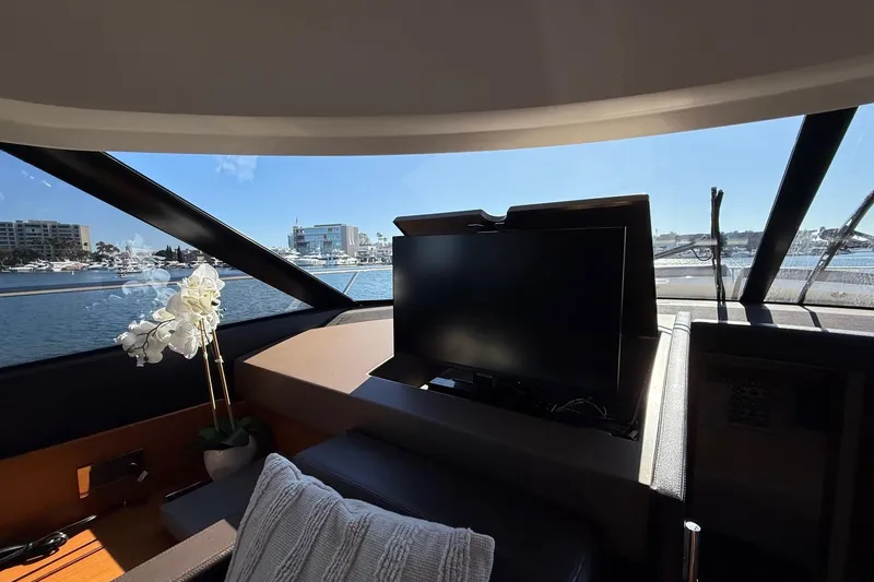 Slide: The Image of Luxurious interior of 2016 Prestige 500 yacht with scenic marina view. - 29