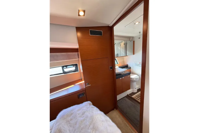 Slide: The Image of Luxurious 2016 Prestige 500 yacht interior with modern bathroom and cozy cabin. - 36