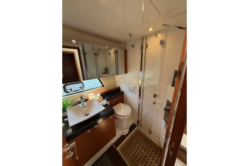 Slide: The Image of Luxurious bathroom in 2016 Prestige 500 yacht with modern fixtures and elegant design. - 37