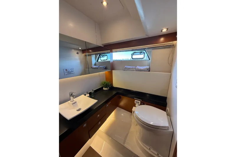 Slide: The Image of Luxurious bathroom in 2016 Prestige 500 yacht with modern fixtures and elegant design. - 46
