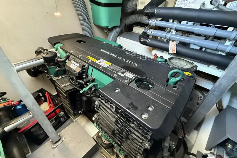 Slide: The Image of Engine room of a 2016 Prestige 500 yacht featuring a Volvo Penta engine. - 48