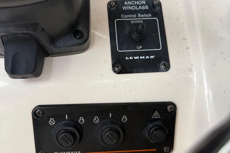 Slide: The Image of Control panel of a 2020 Grady-White Fisherman 257 boat with Lewmar anchor windlass switch. - 20
