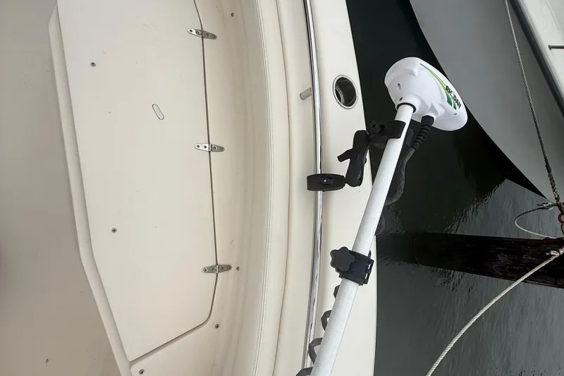 Slide: The Image of 2020 Grady-White Fisherman 257 boat with mounted trolling motor at dock. - 21