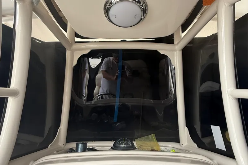 Slide: The Image of 2020 Grady-White Fisherman 257 boat interior with compass and equipment. - 23