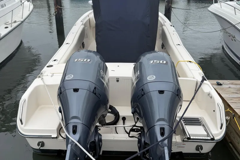 Slide: The Image of 2020 Grady-White Fisherman 257 boat with dual Yamaha 150 engines docked at marina. - 3