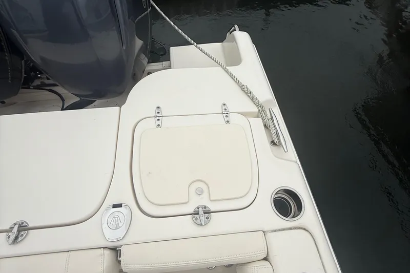 Slide: The Image of 2020 Grady-White Fisherman 257 boat deck with storage compartments and rope. - 32