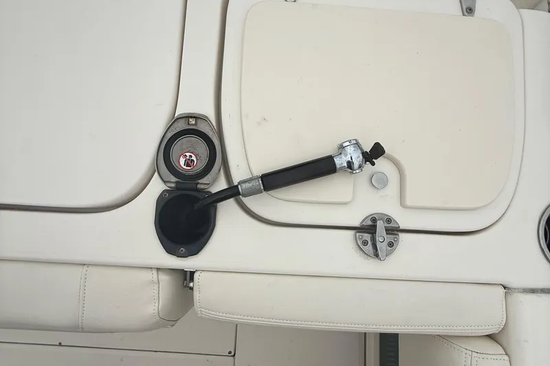 Slide: The Image of Fuel cap and hose on 2020 Grady-White Fisherman 257 boat deck. - 41