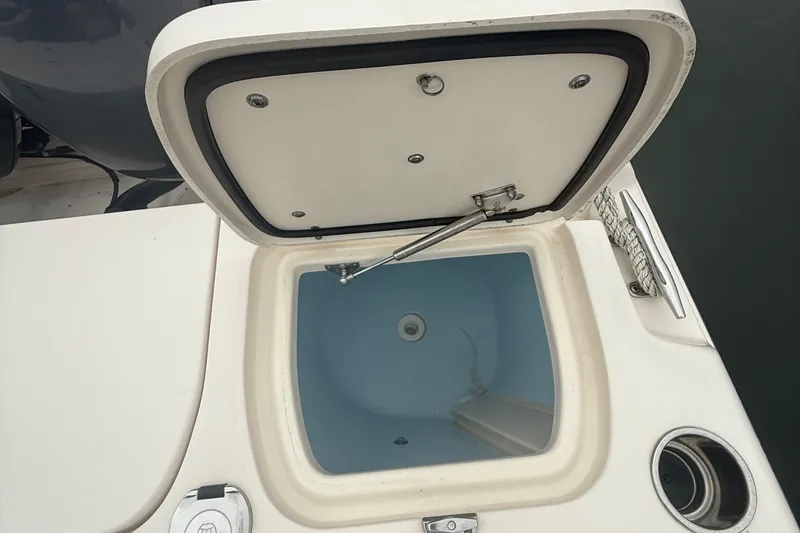 Slide: The Image of Open storage compartment on 2020 Grady-White Fisherman 257 boat. - 45