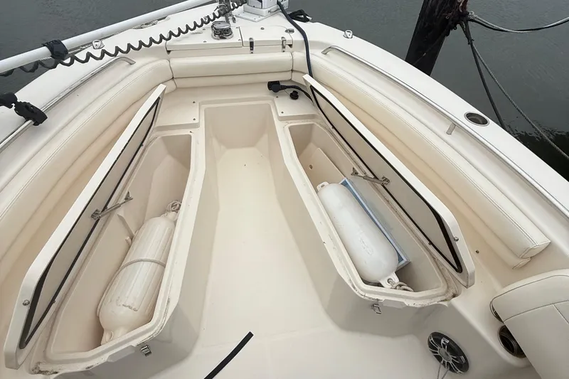 Slide: The Image of 2020 Grady-White Fisherman 257 boat interior with open storage compartments. - 49
