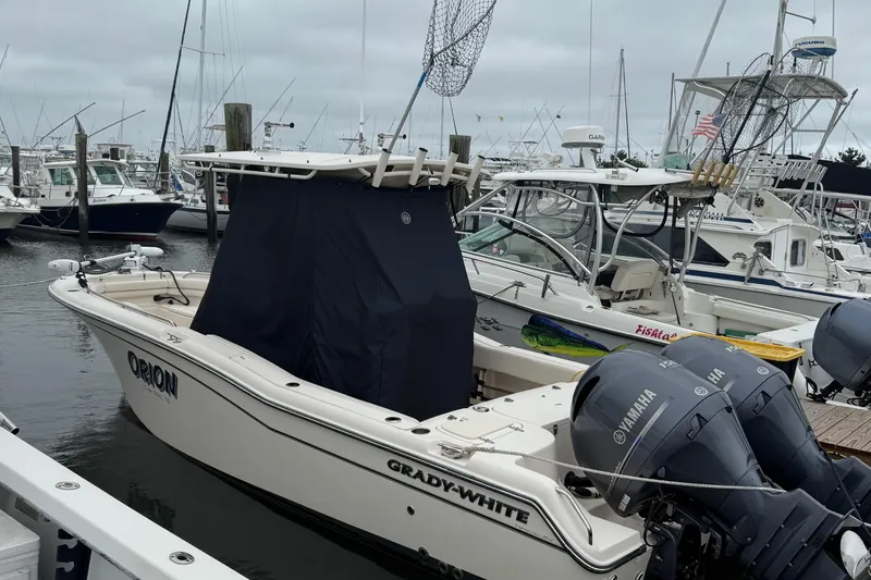 Slide: The Image of 2020 Grady-White Fisherman 257 boat docked with Yamaha engines, covered console. - 5