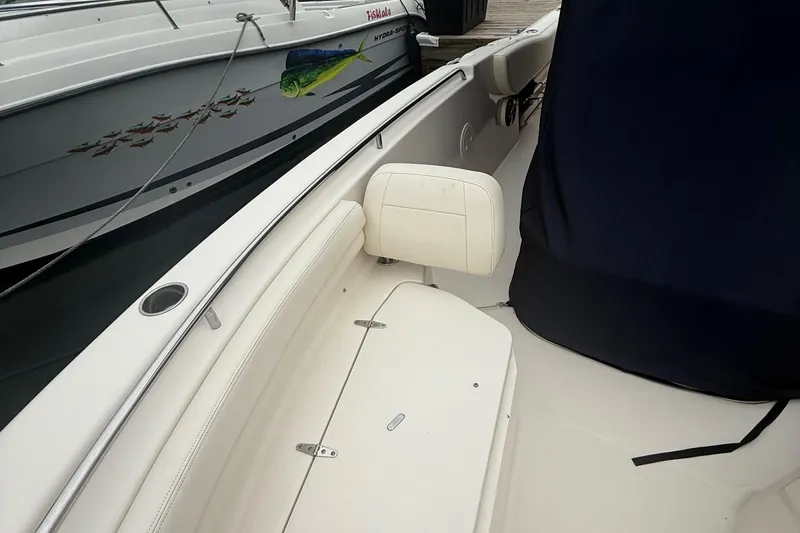Slide: The Image of 2020 Grady-White Fisherman 257 boat interior with white seating and sleek design. - 50