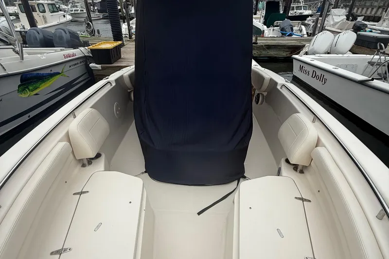 Slide: The Image of 2020 Grady-White Fisherman 257 boat interior with seating, docked at marina. - 52