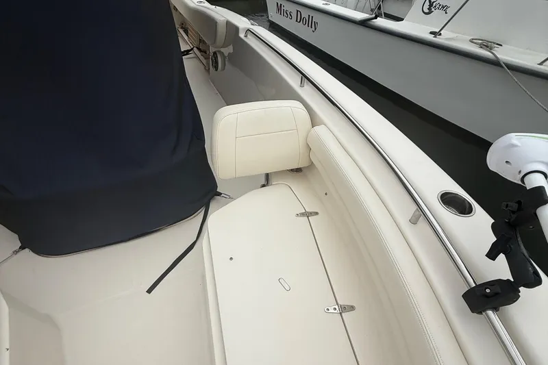 Slide: The Image of 2020 Grady-White Fisherman 257 boat interior with seating and covered equipment. - 54