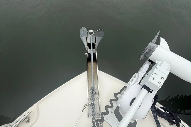 Slide: The Image of Bow of 2020 Grady-White Fisherman 257 with anchor and motor in water. - 8