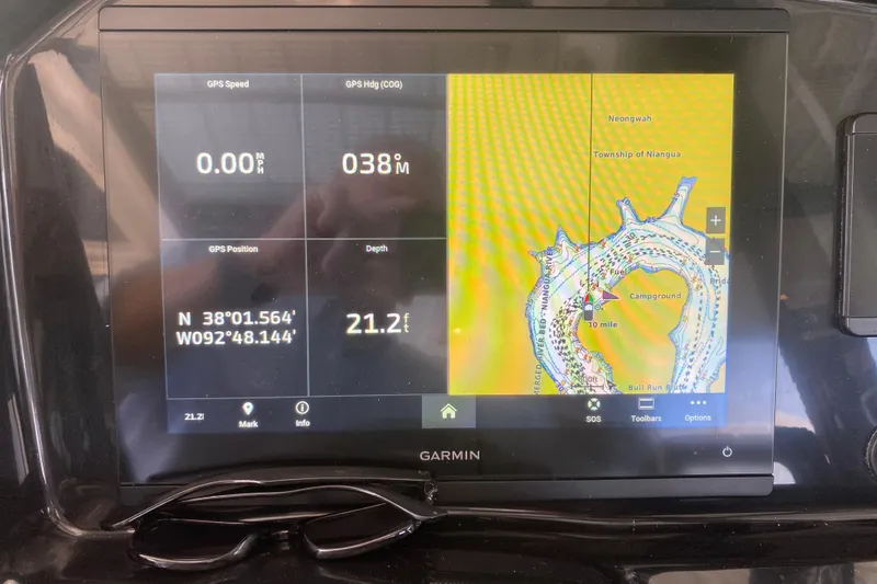 Slide: The Image of Garmin GPS display on 2024 Jeanneau NC 895 boat showing map and coordinates. - 34