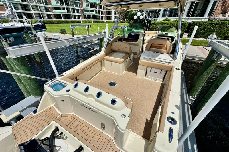 Slide: The Image of 2023 Chris-Craft Calypso 28 boat interior, featuring spacious seating and elegant design. - 8