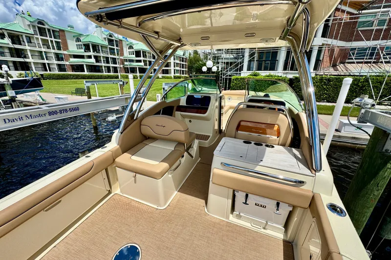 Slide: The Image of 2023 Chris-Craft Calypso 28 boat interior with luxurious seating and modern amenities. - 9