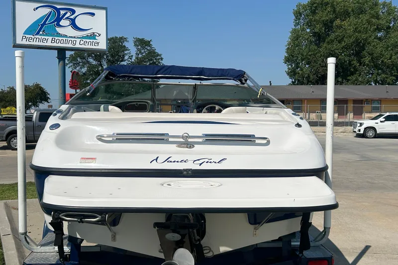 Slide: The Image of 2003 Crownline 192 BR boat at Premier Boating Center, rear view. - 18