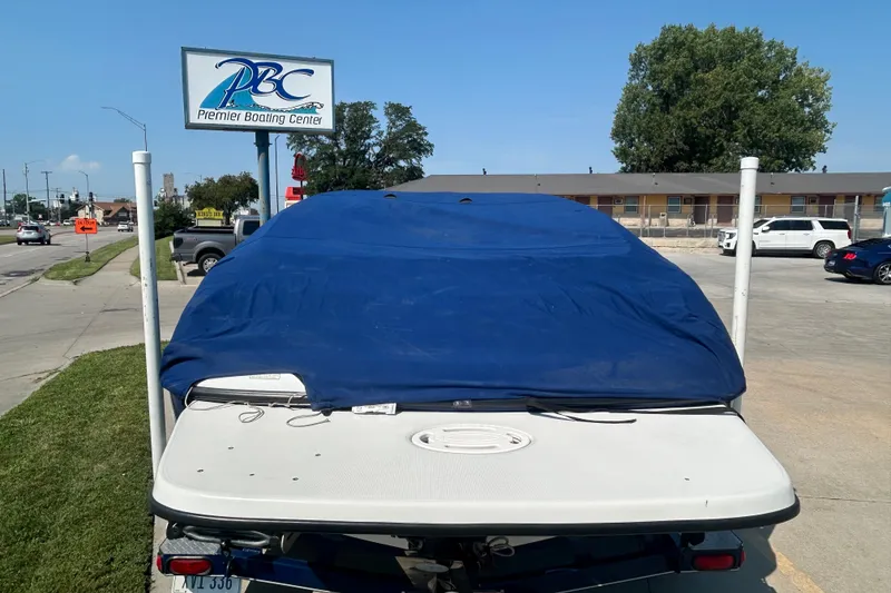 Slide: The Image of 2003 Crownline 192 BR boat with blue cover at Premier Boating Center. - 3