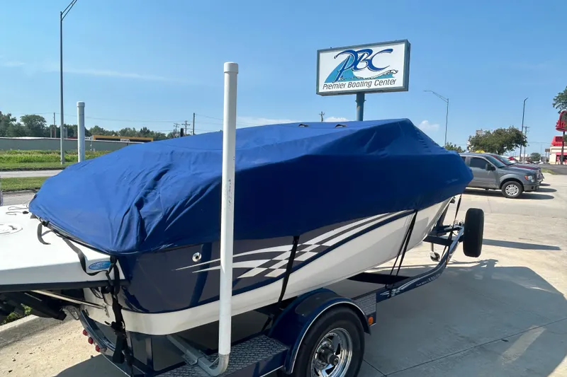 Slide: The Image of 2003 Crownline 192 BR boat with blue cover at Premier Boating Center. - 7