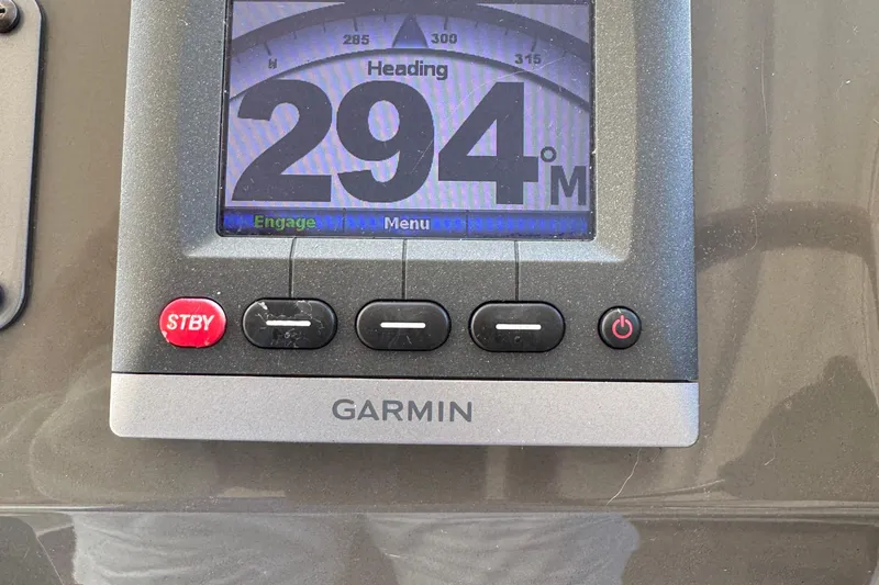 Slide: The Image of Garmin navigation display showing heading 294° on a 2010 Regal 44 Sport Coupe. - 14