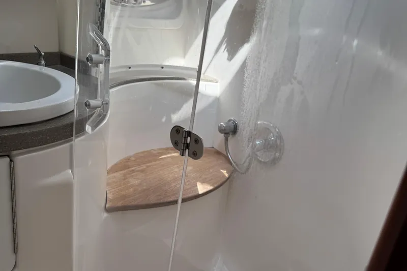 Slide: The Image of Bathroom interior of 2010 Regal 44 Sport Coupe yacht with shower and sink. - 26