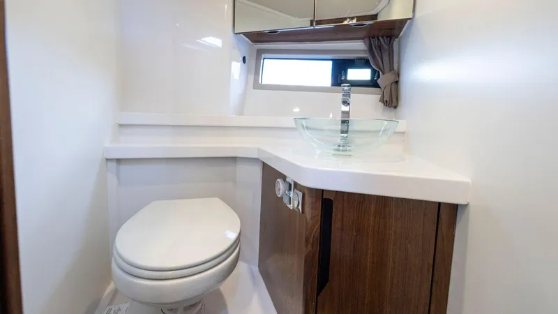 Slide: The Image of Modern bathroom in 2025 Aquador 300 HT yacht with sleek fixtures and compact design. - 20