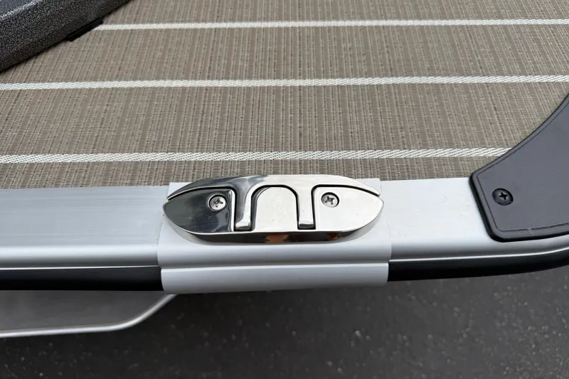 Slide: The Image of 2026 Bentley Pontoons Elite 253 Admiral deck detail with stainless steel hardware. - 11
