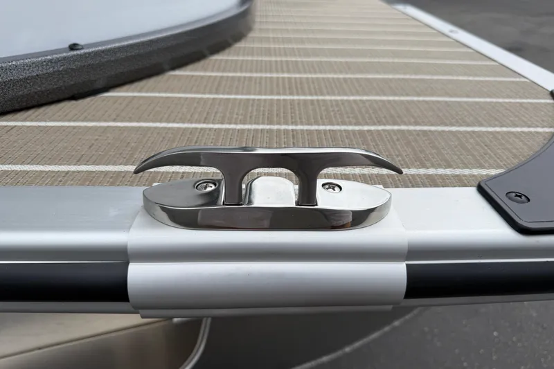Slide: The Image of 2026 Bentley Pontoons Elite 253 Admiral deck cleat detail, showcasing sleek design. - 12