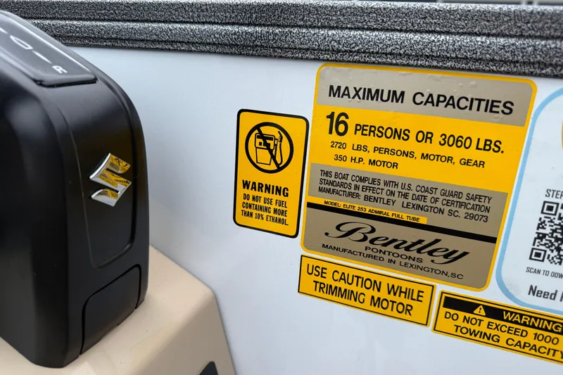 Slide: The Image of 2026 Bentley Pontoons Elite 253 Admiral capacity label, showing maximum load and safety warnings. - 24