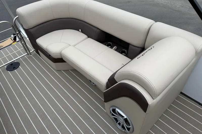 Slide: The Image of 2026 Bentley Pontoons Elite 253 Admiral interior seating with luxurious beige upholstery. - 30