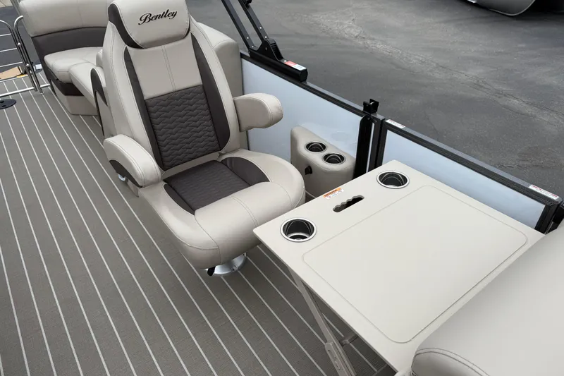 Slide: The Image of Luxurious interior of 2026 Bentley Pontoons Elite 253 Admiral with plush seating and table. - 38