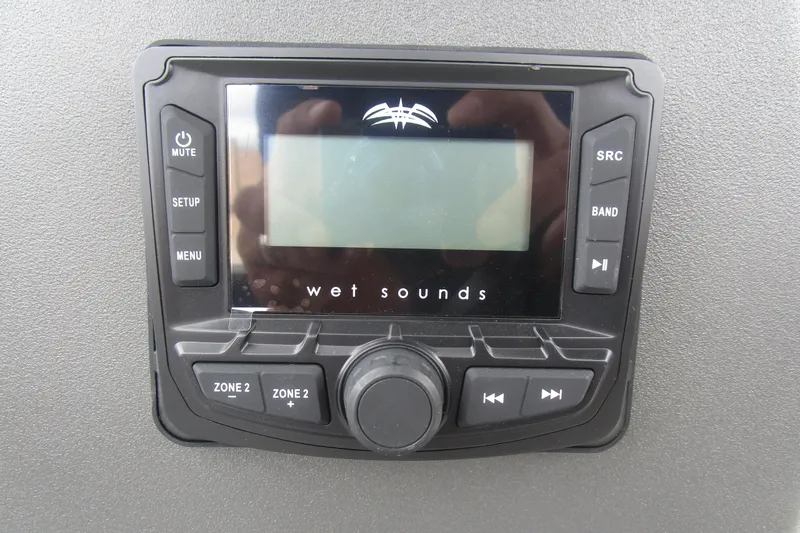 Slide: The Image of Wet Sounds audio system on 2026 Sun Tracker Bass Buggy 18 DLX boat dashboard. - 12