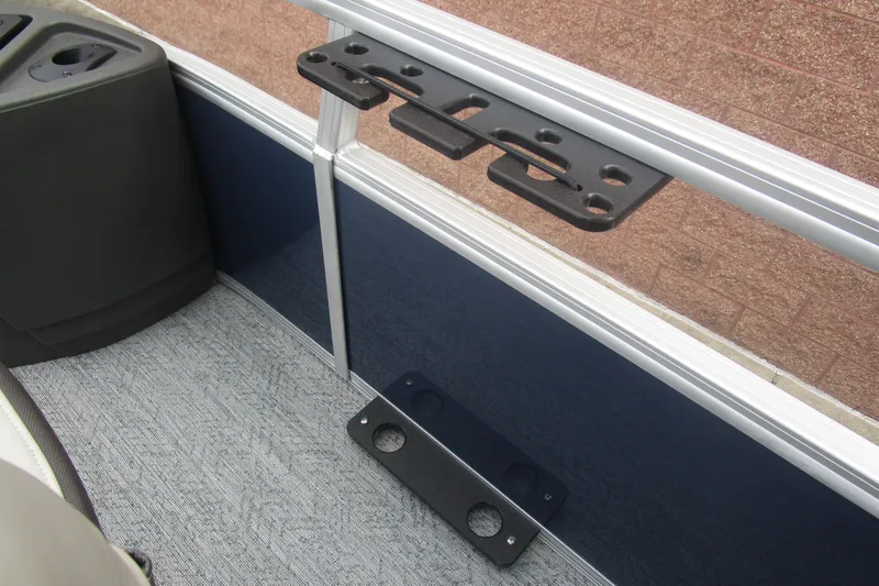 Slide: The Image of 2026 Sun Tracker Bass Buggy 18 DLX interior detail with mounted accessory holder. - 14