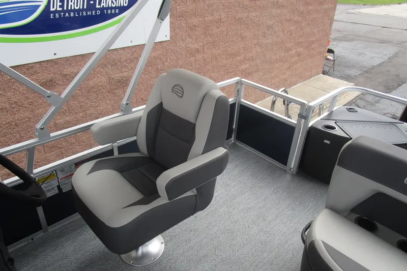 Slide: The Image of 2026 Sun Tracker Bass Buggy 18 DLX boat interior with comfortable seating and modern design. - 9
