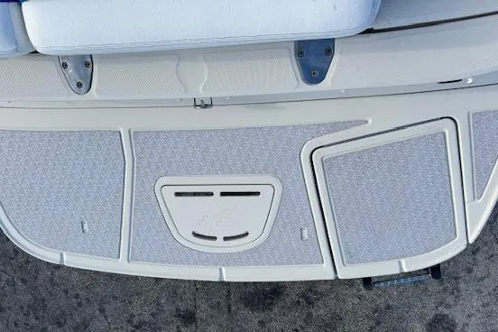 Slide: The Image of 2009 Sea Ray 230 Sundeck swim platform with textured surface and seating. - 36