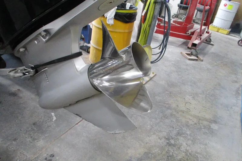 Slide: The Image of 2024 Nitro Z20 boat propeller in a workshop setting. - 14