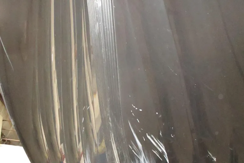 Slide: The Image of Shiny black surface of 2024 Nitro Z20, reflecting light and surroundings. - 17