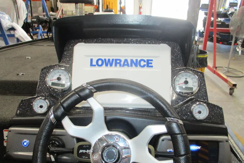 Slide: The Image of 2024 Nitro Z20 boat dashboard with Lowrance display and gauges. - 3